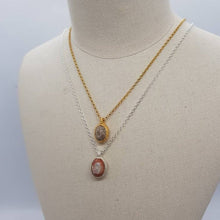 Load image into Gallery viewer, Mexican boulder opal necklaces in silver and gold displayed on a mannequin
