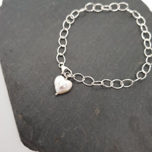 Load image into Gallery viewer, chunky sterling silver bracelet with heart shaped freshwater pearl
