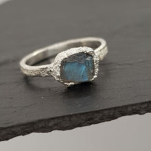 Load image into Gallery viewer, raw labradorite silver textured ring displayed on slate
