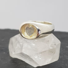 Load image into Gallery viewer, moonstone heart sunken silver signet ring on crystal
