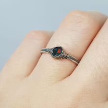 Load image into Gallery viewer, raw black opal oxidised silver ring on finger
