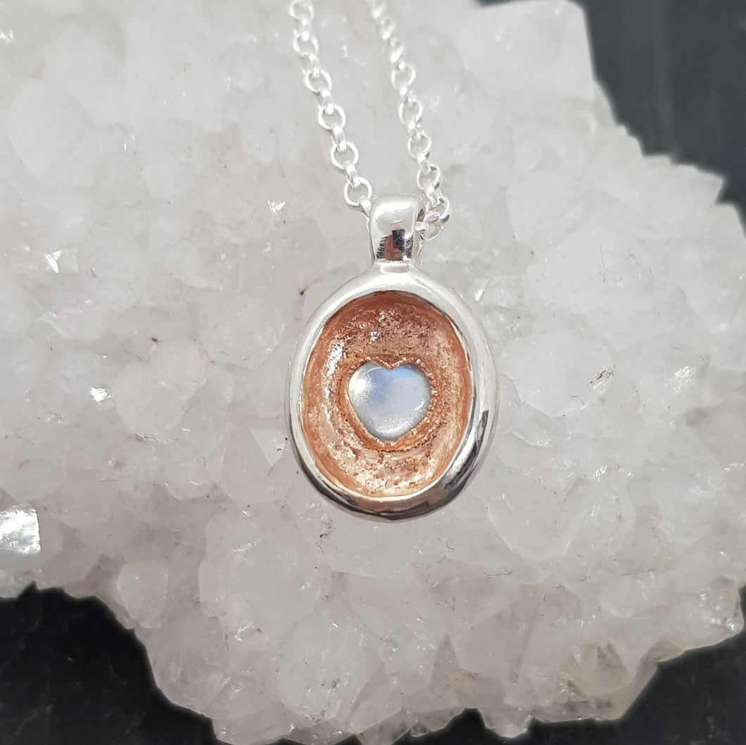 moonstone heart crevice necklace in silver and rose gold