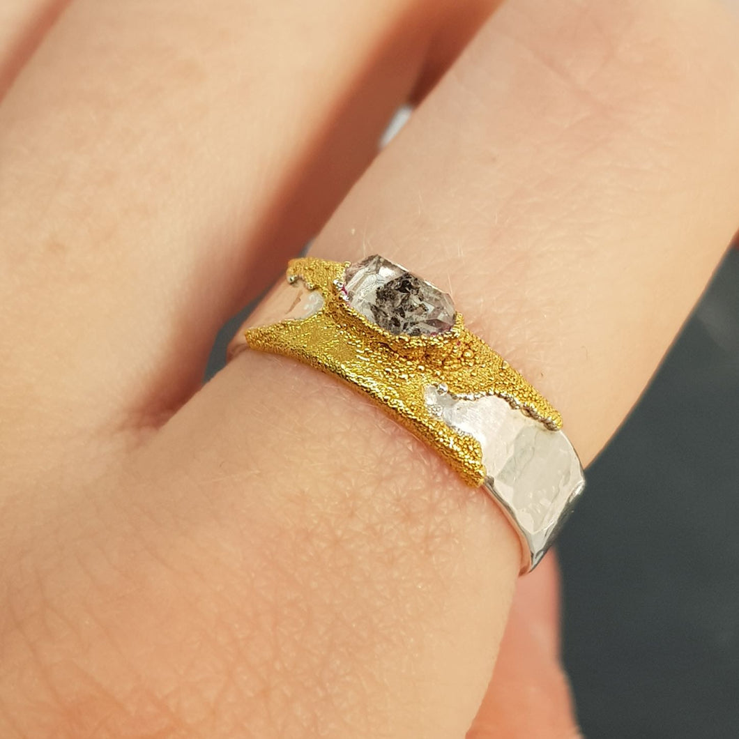 raw herkimer diamond textured ring on finger
